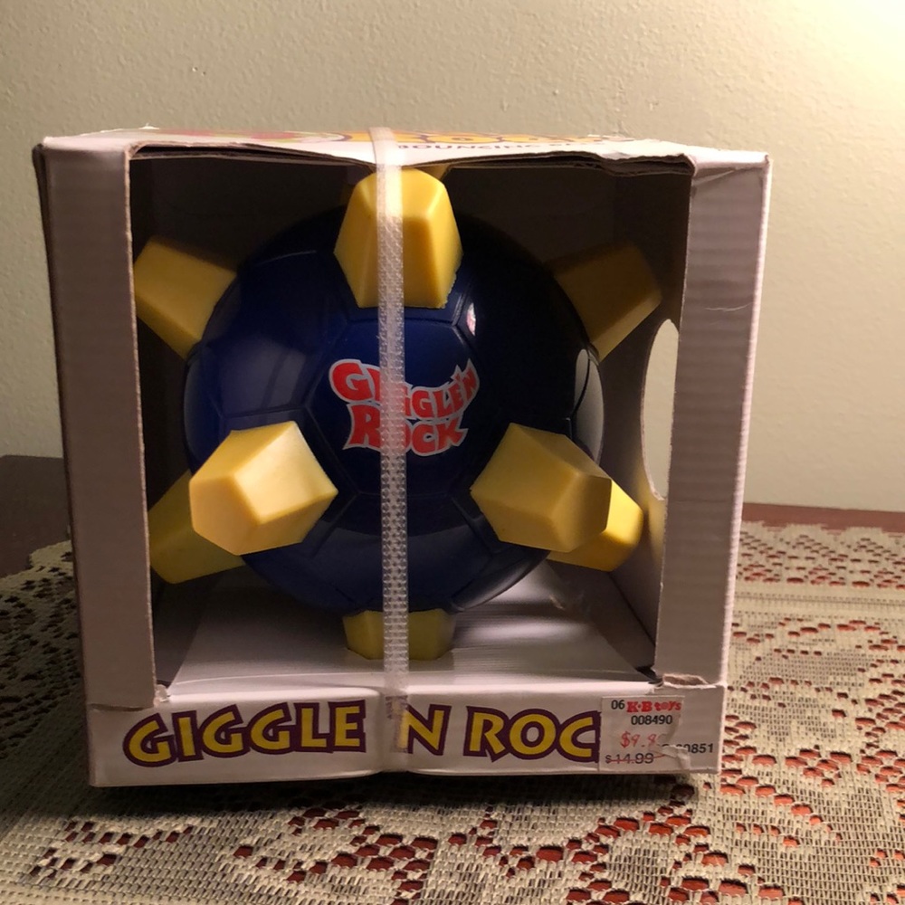 Vintage Giggle N Rock Toy